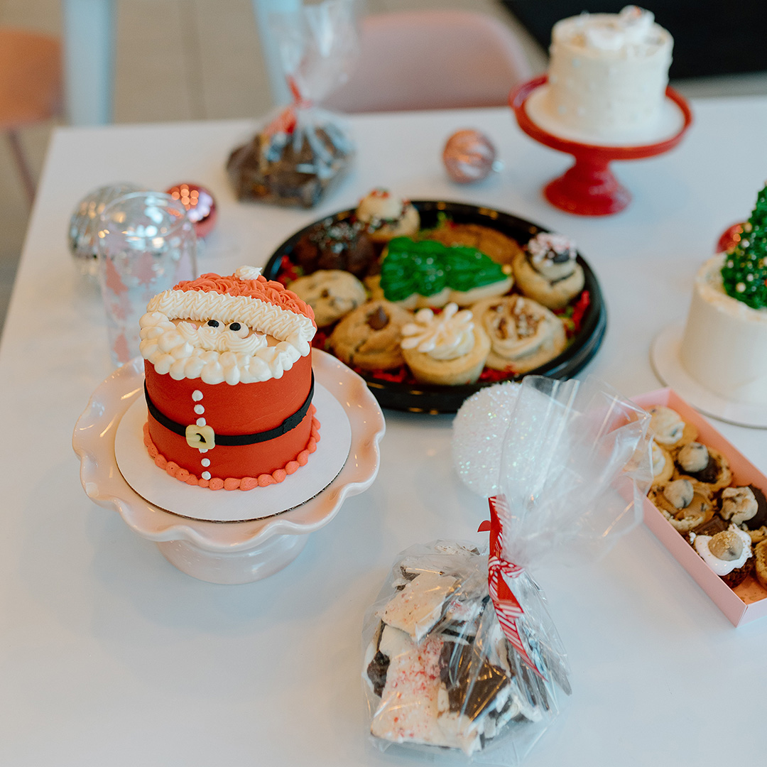 Santa claus cookies on a table.